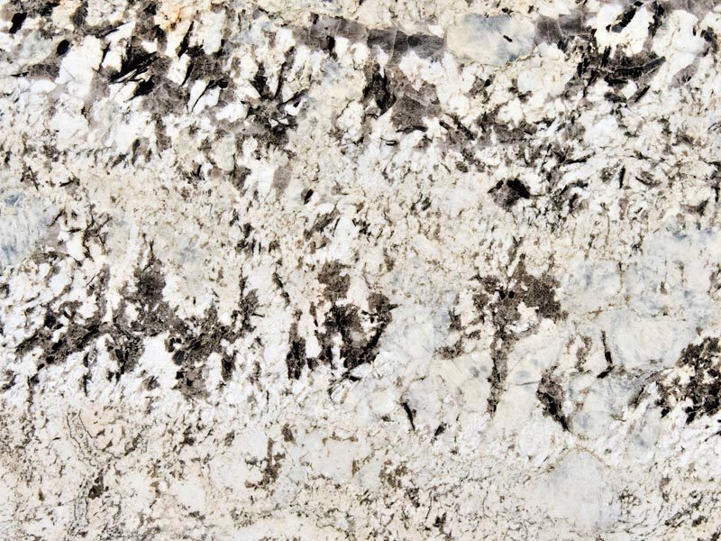 Alaska White Granite slab &mdash; cool white to pale grey with fine mineral speckles