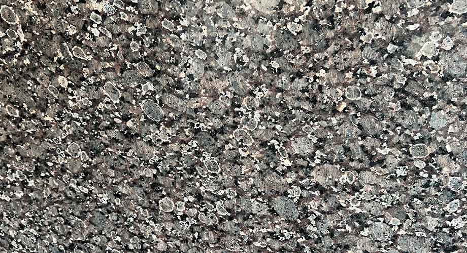 Crystal Brown Granite slab &mdash; warm brown with prominent light crystal inclusions and mica sparkle