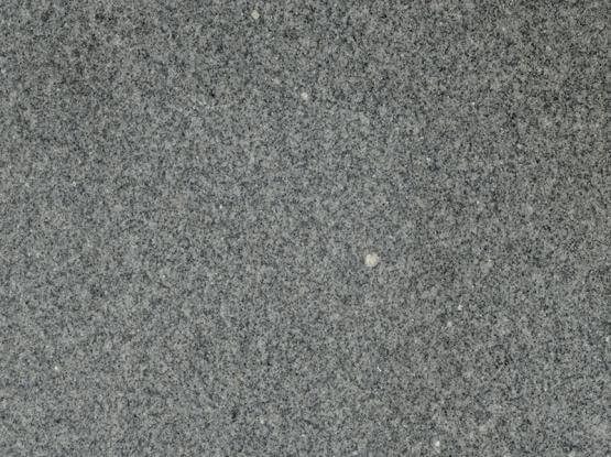 Sierra Grey Granite slab &mdash; medium grey with balanced salt-and-pepper mineral speckles