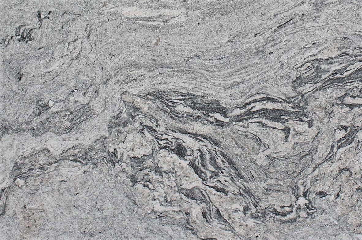 Viscount White granite slab with fine dark speckle on a light ground &mdash; Gemarix